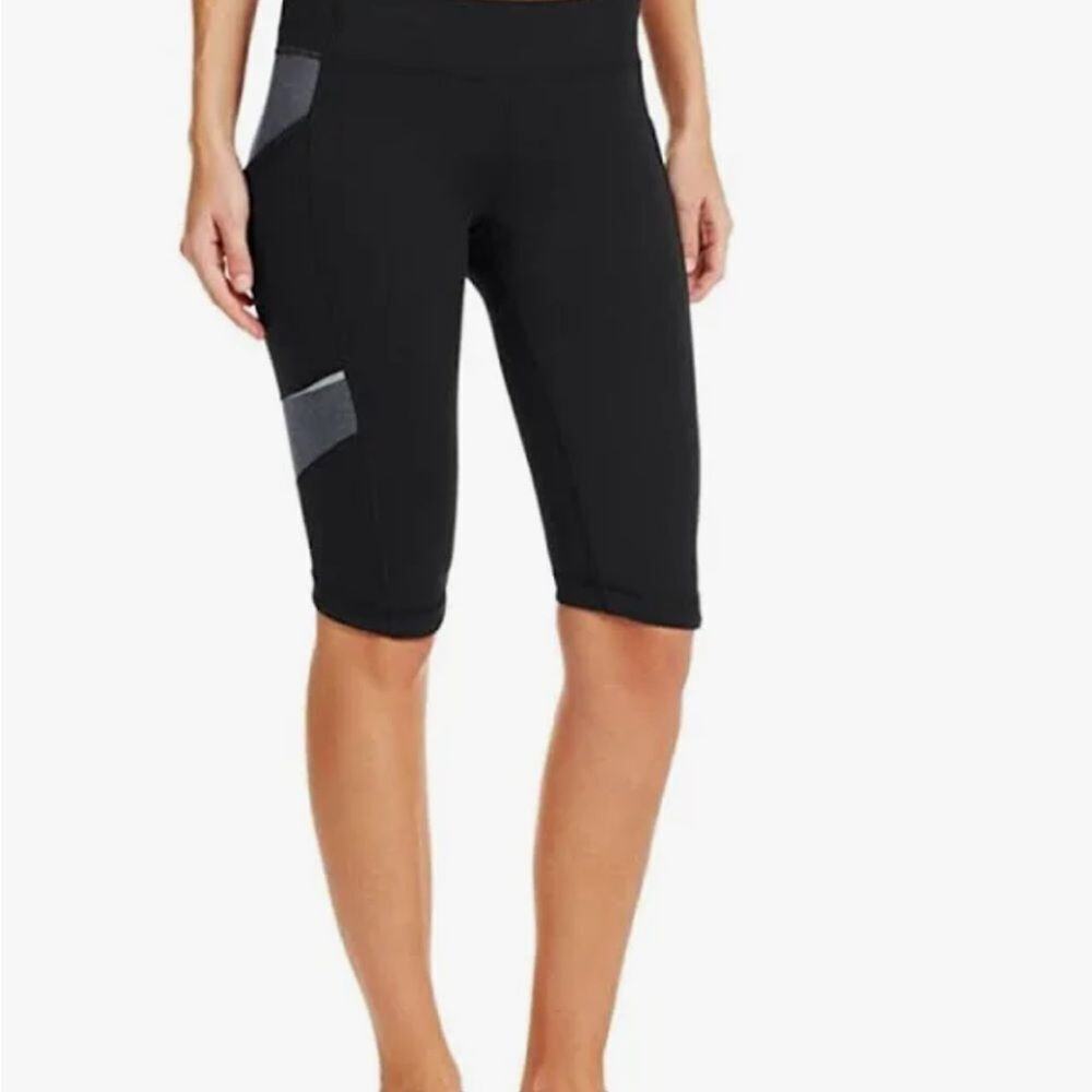 Under armour woman’s bike shorts all seasons, size small, black with pockets